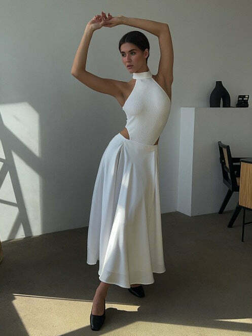 Vintage-inspired high-waisted satin maxi skirt for a timeless and chic look