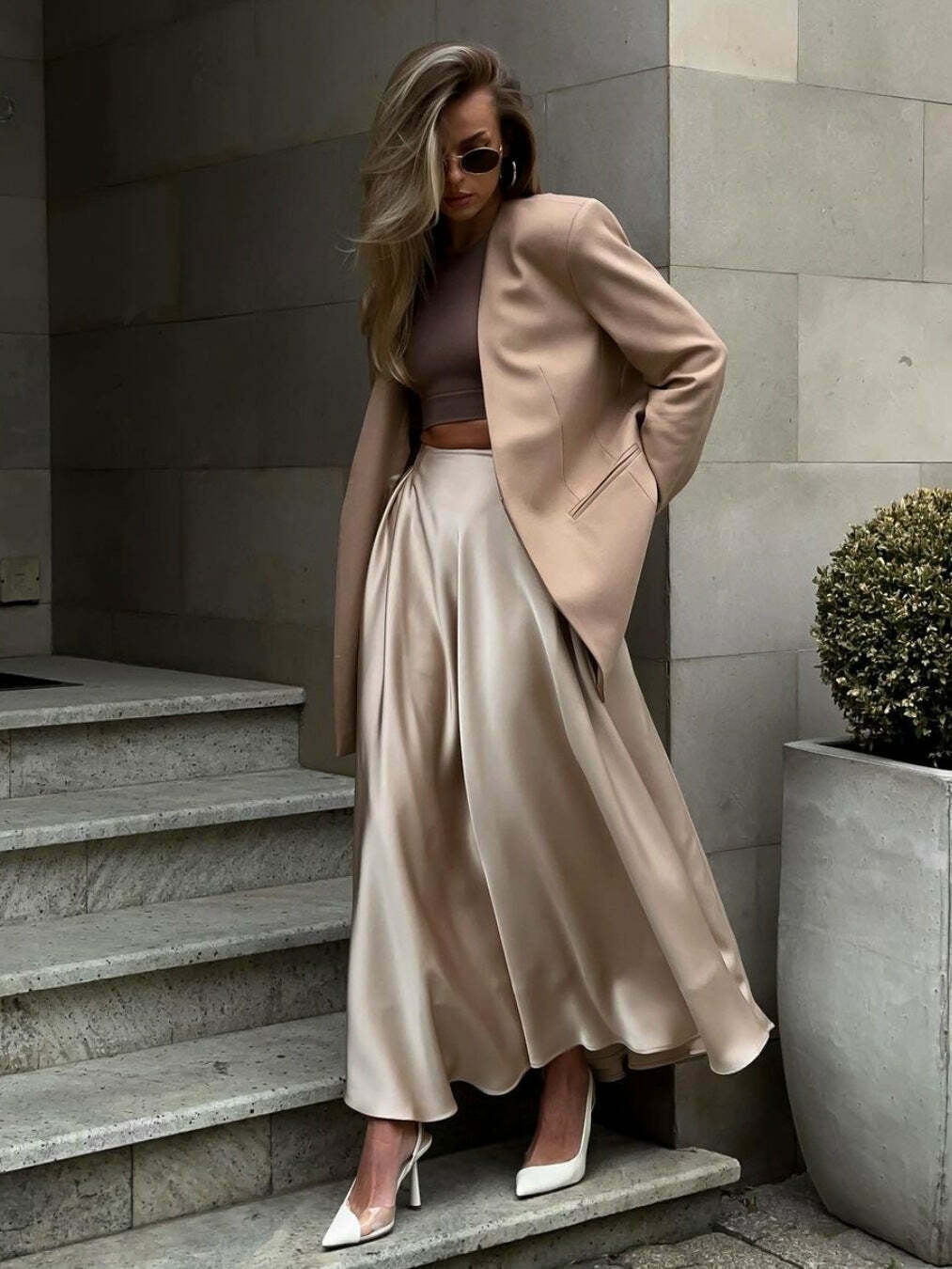 Vintage-inspired high-waisted satin maxi skirt for a timeless and chic look