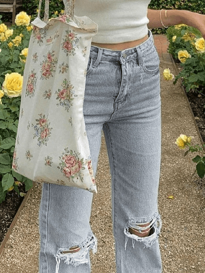 Y2K Aesthetic: Light Wash Ripped Jeans - Coquette Fashion with Grunge Style