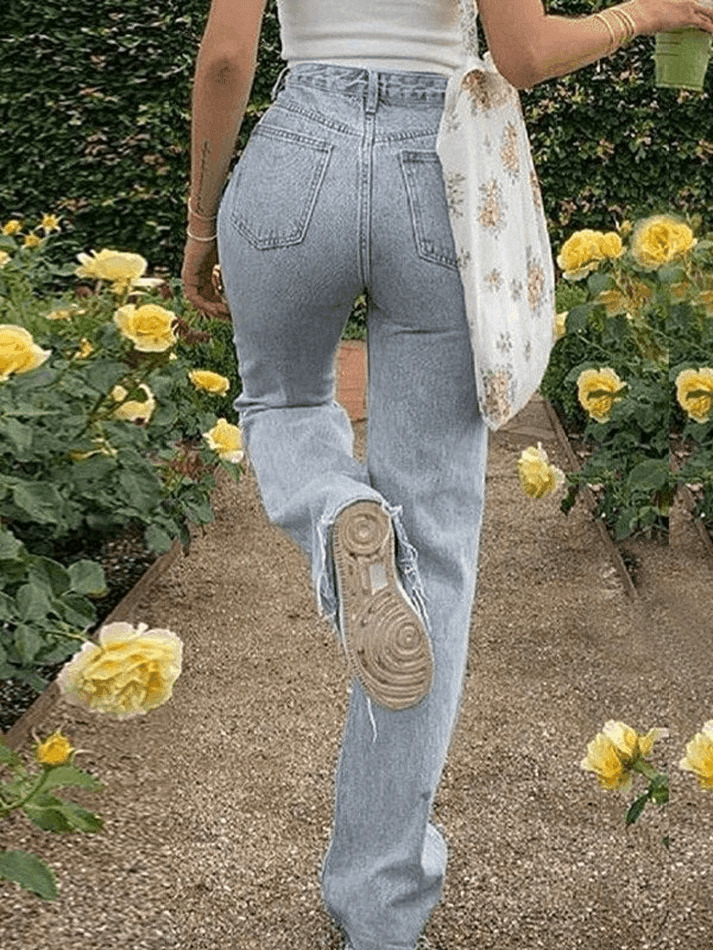 Y2K Aesthetic: Light Wash Ripped Jeans - Coquette Fashion with Grunge Style