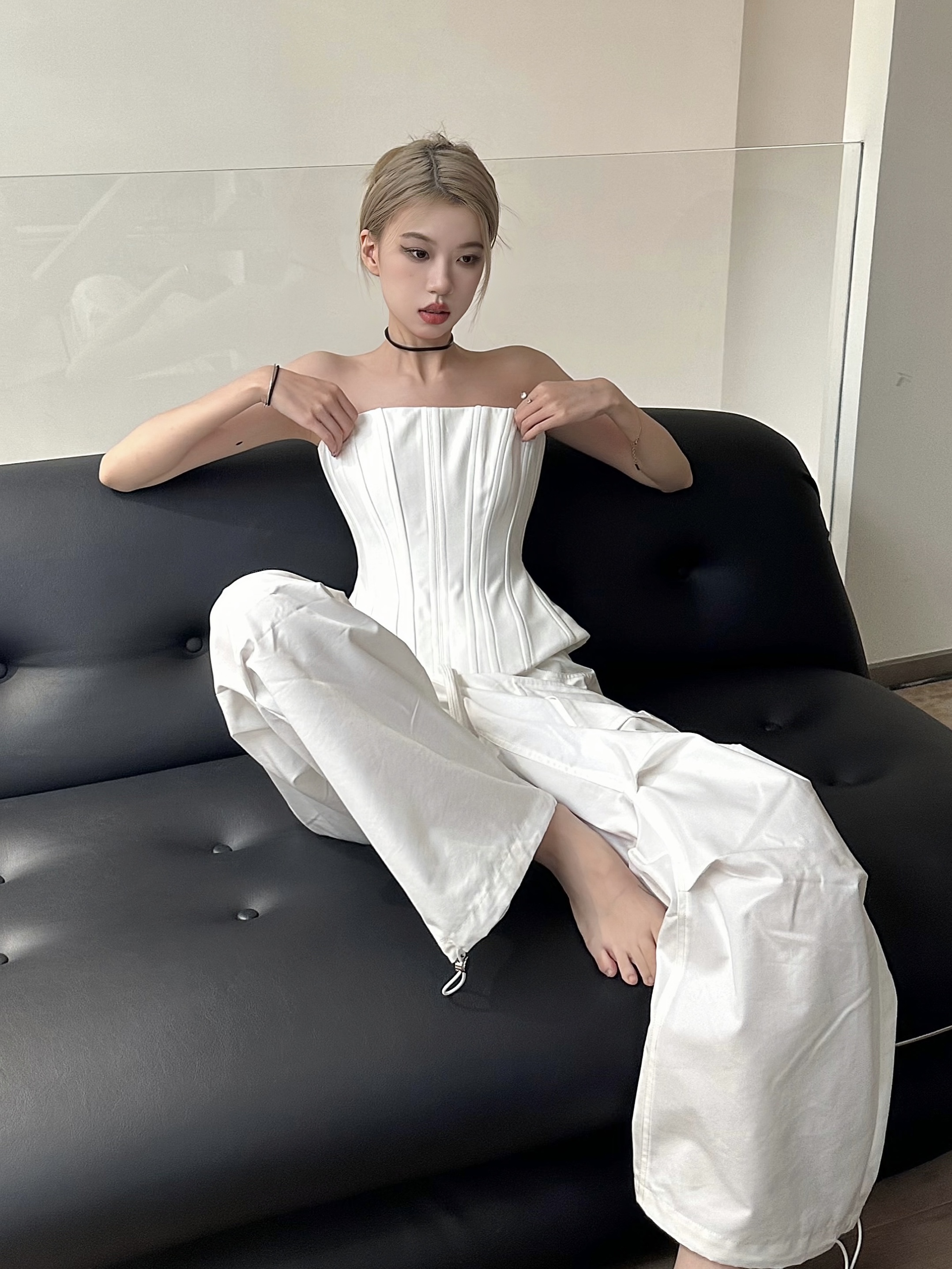 Black and White Fishbone Strapless Top with Waist-Cinching Design and Straight-Leg Parachute Pants for Cool Y2K Workwear Style