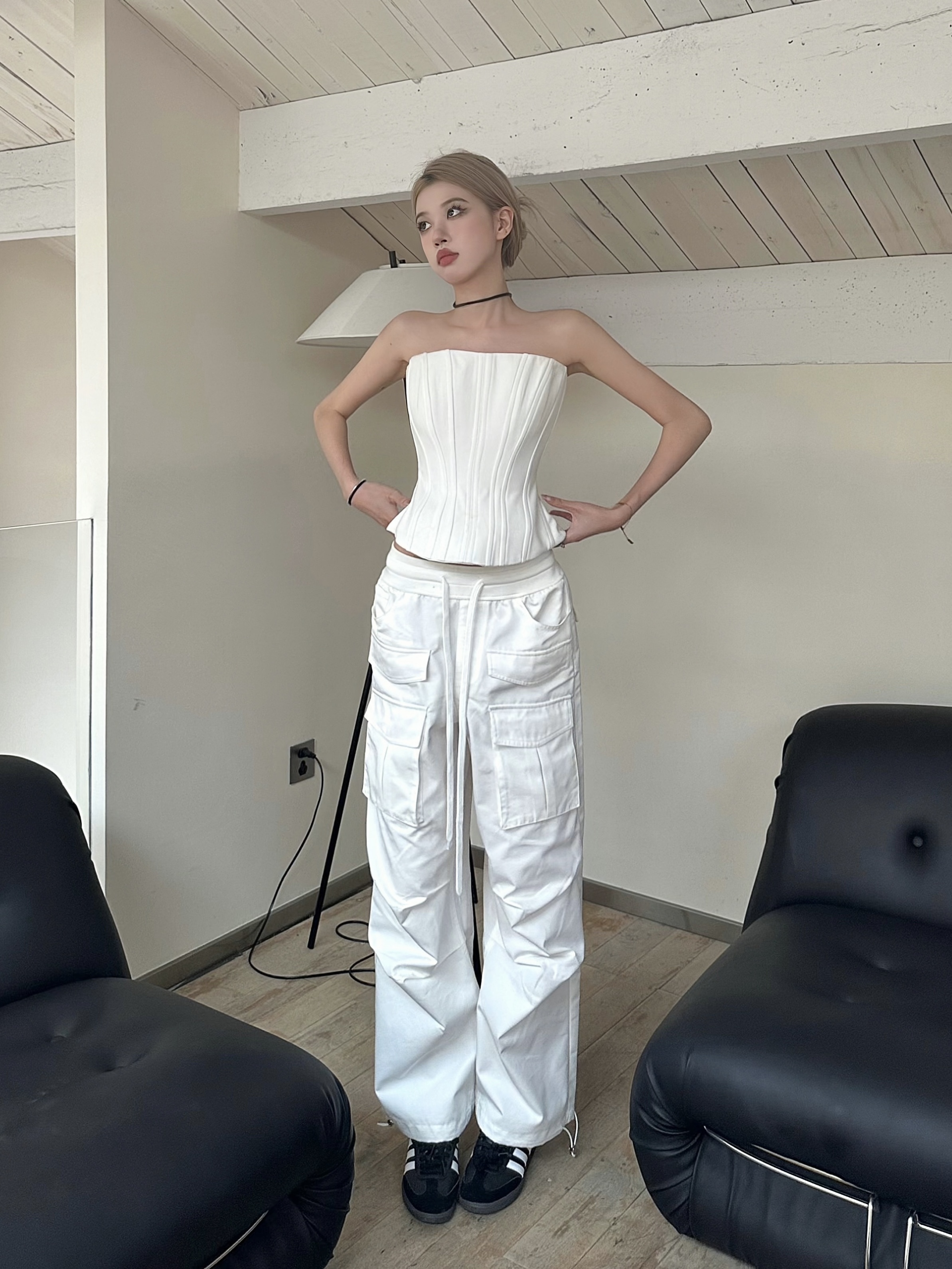 Black and White Fishbone Strapless Top with Waist-Cinching Design and Straight-Leg Parachute Pants for Cool Y2K Workwear Style